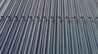 Close up of the cylinders used to heat up the hot water on the roof of zero carbon house, Birmingham