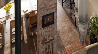 Looking down into zero carbon house, Birmingham from the studio, showing the living room