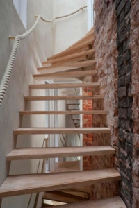 Open stairs at zero carbon house, Birmingham allow light to flood through